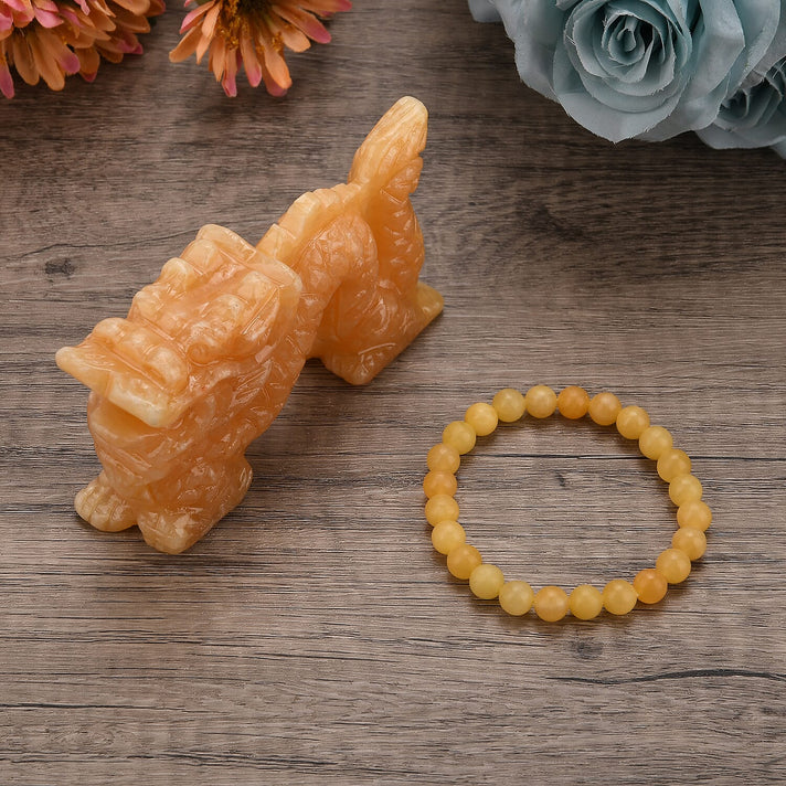 The Carved Treasure Collection - Honey Serpentine Carved Dragon Ornament 1775.00 Ct. V32639529 2