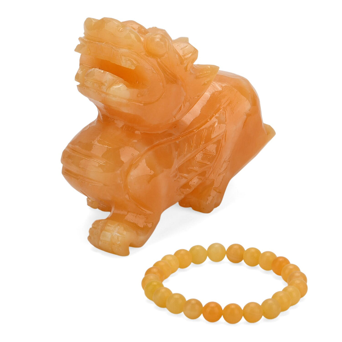 The Carved Treasure Collection - Honey Serpentine Carved Qi Lin Ornament 3215.00 Ct. V32515806 0