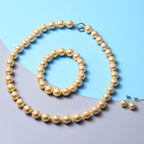Shell Pearl Necklace (Size 20) Stretchable Bracelet and Stud Earrings in Golden Colour