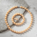 Set of 3 - Golden Shell Pearl Beads Stretchable Bracelet (Size - 7), Push Back Earring & T-Bar Clasp Necklace (Size - 20)