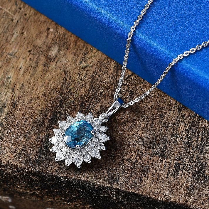 Certified and Appraised Blue Zircon,  Moissanite Pendant with Torn Chain 19DC (Size 20) in Rhodium Overlay Sterling Silver 0.82 ct  2.470  Ct. 4472623 2
