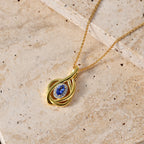 D'Joy - Tanzanite & White Zircon Twisted Halo Pendant with Chain (Size 20) in Yellow Gold Plated Sterling Silver_4476887_2