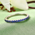 RHAPSODY 950 Platinum AAAA Ceylon Sapphire Half-Eternity Band Ring