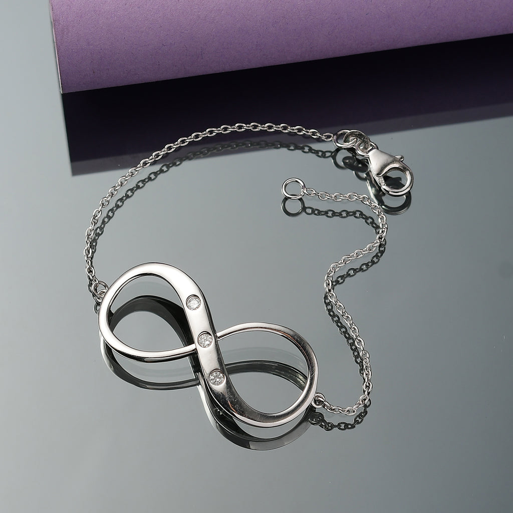 Luxuriant Lab Grown Diamond (SI-G/H) Infinity Bracelet (Size - 7.5) with Lobster Clasp in Rhodium Overlay Sterling Silver_8192186_1
