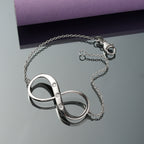 Luxuriant Lab Grown Diamond (SI-G/H) Infinity Bracelet (Size - 7.5) with Lobster Clasp in Rhodium Overlay Sterling Silver_8192186_1