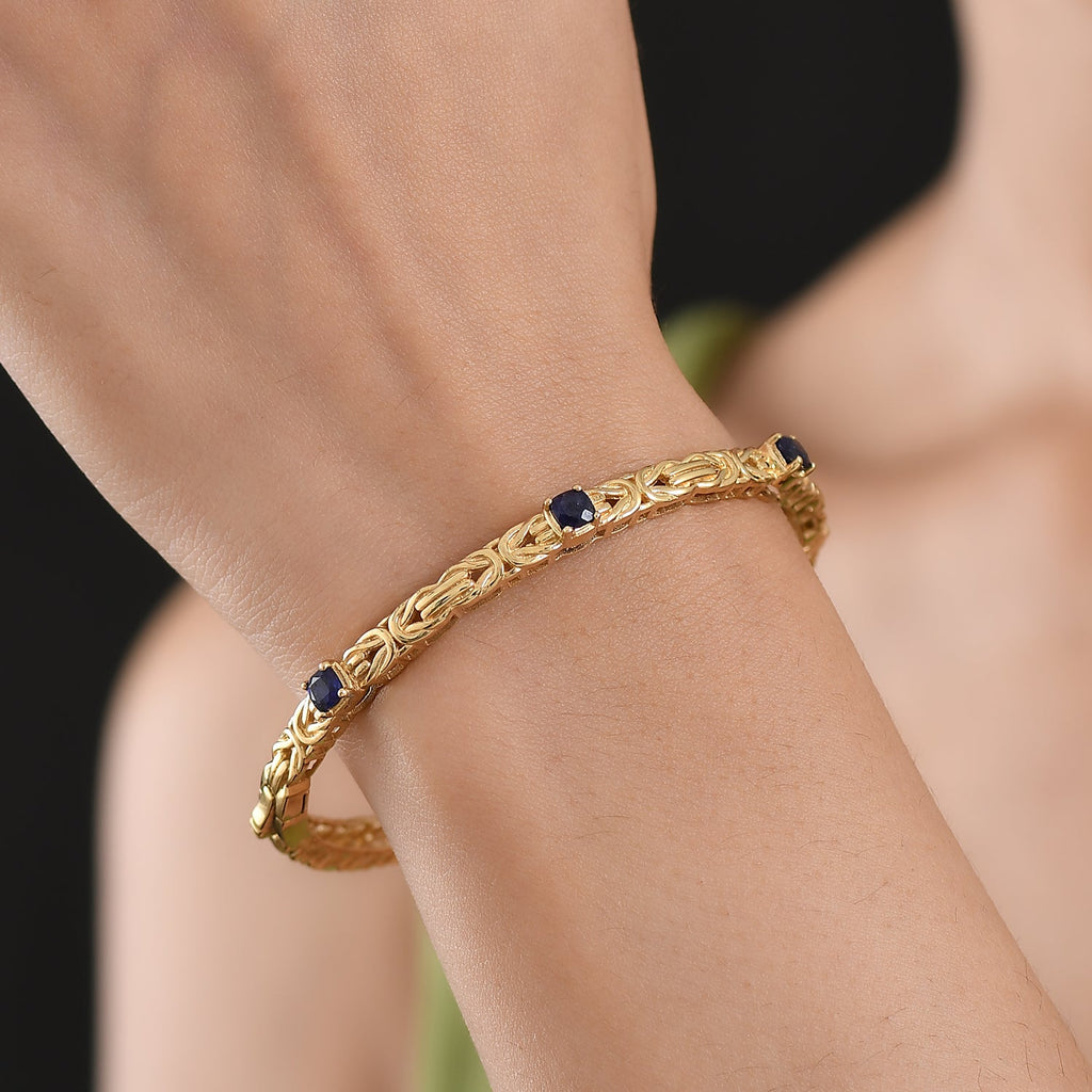 Byzantine Bangle Masoala Blue Sapphire (Size-7.5) in Yellow Gold Tone