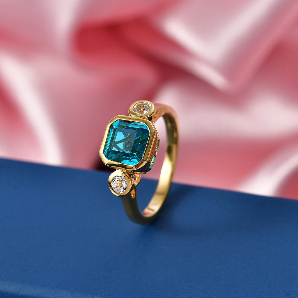 D'Joy Capri Blue Quartz & White Topaz Emerald Cut Trilogy Ring in Yellow Gold Plated Sterling Silver 2.23 Ct._8485394_2