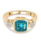 D'Joy Capri Blue Quartz & White Topaz Emerald Cut Trilogy Ring in Yellow Gold Plated Sterling Silver 2.23 Ct._8485396