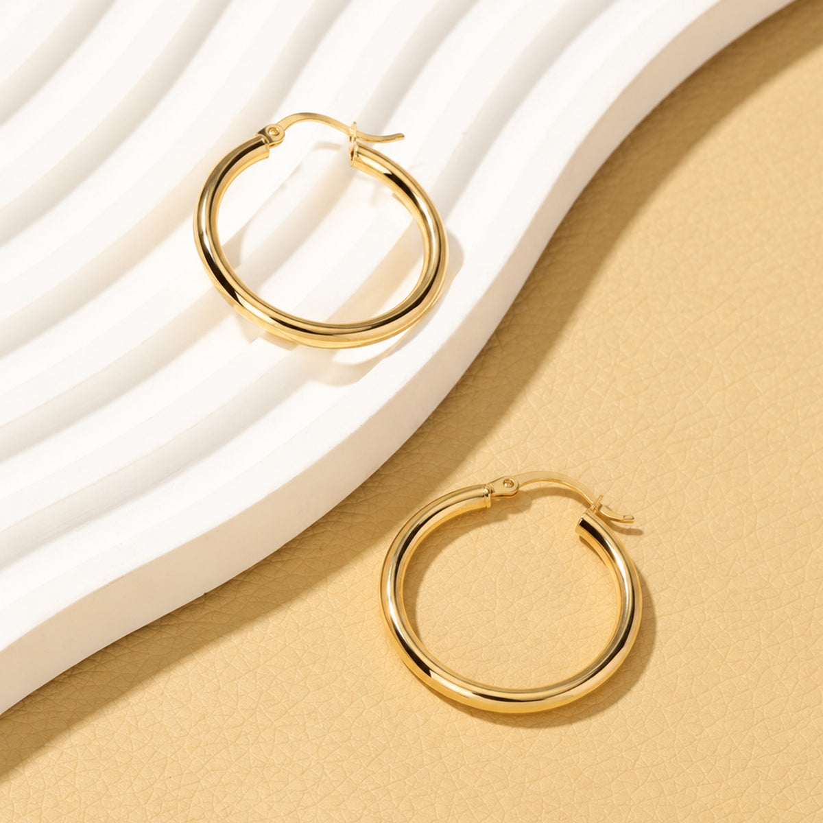 9K Yellow Gold Oval Hoop Earrings 8562047 1