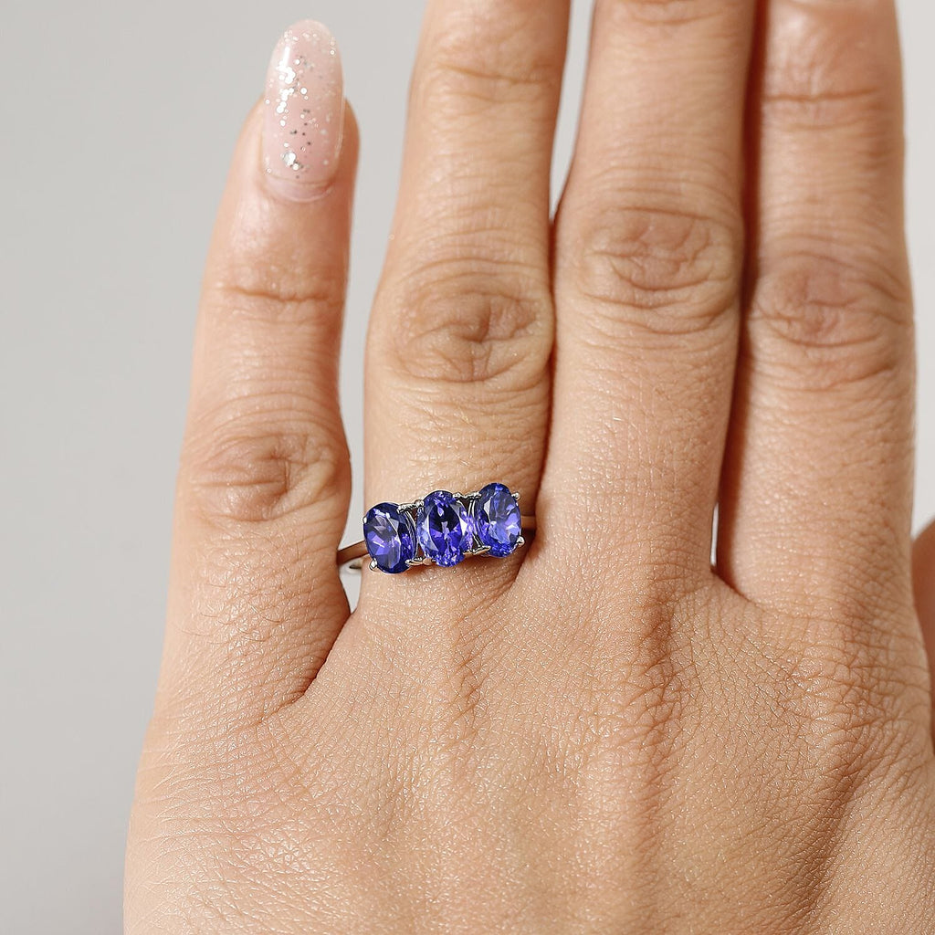 950 Platinum AAAA Tanzanite Trilogy Ring 2.48 Ct, Platinum Wt. 3.90 Gms.