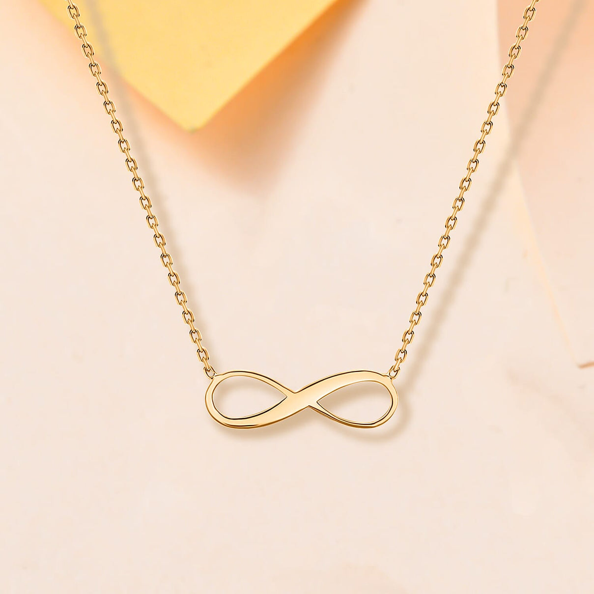 9K Yellow Gold 15.5mm X 5.3mm Infinity Adjustable Necklace 16 to 18 Inch 7189778 1