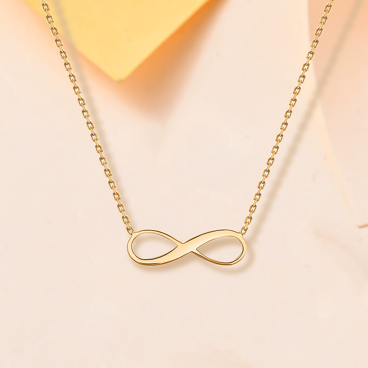 9K Yellow Gold 15.5mm X 5.3mm Infinity Adjustable Necklace 16 to 18 Inch 7189778 1