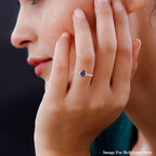 9K Yellow Gold Tanzanite and Moissanite Ring 1.00 Ct.