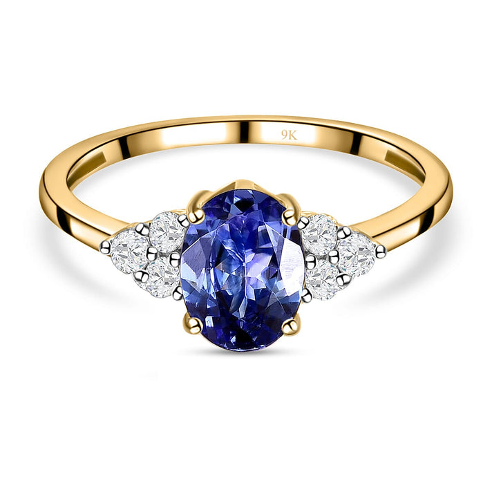 9K Yellow Gold AA Tanzanite and Diamond I3 GH Classic Trilogy Solitaire Ring 7017224 1