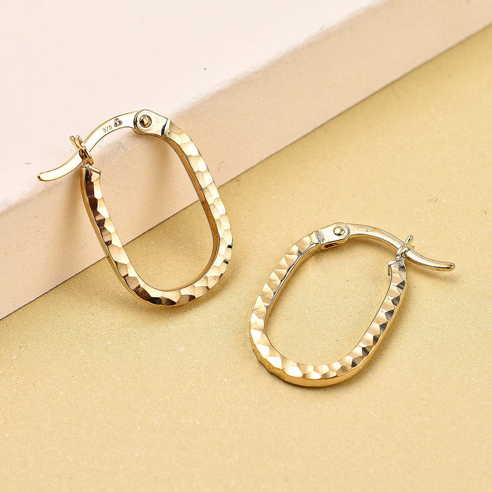 9K Yellow Gold Diamond Cut 10.5mm x 11mm Oval Hoop Earring 7254655 2