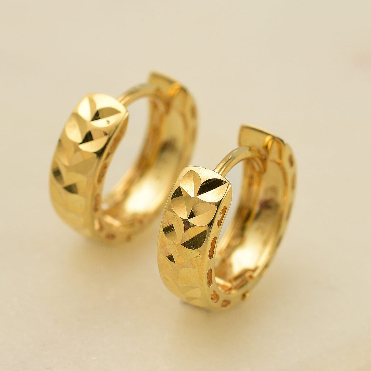 Vicenza Closeout - 9K Yellow Gold Diamond Cut Leaf Design Creole Earrings 7711220 1