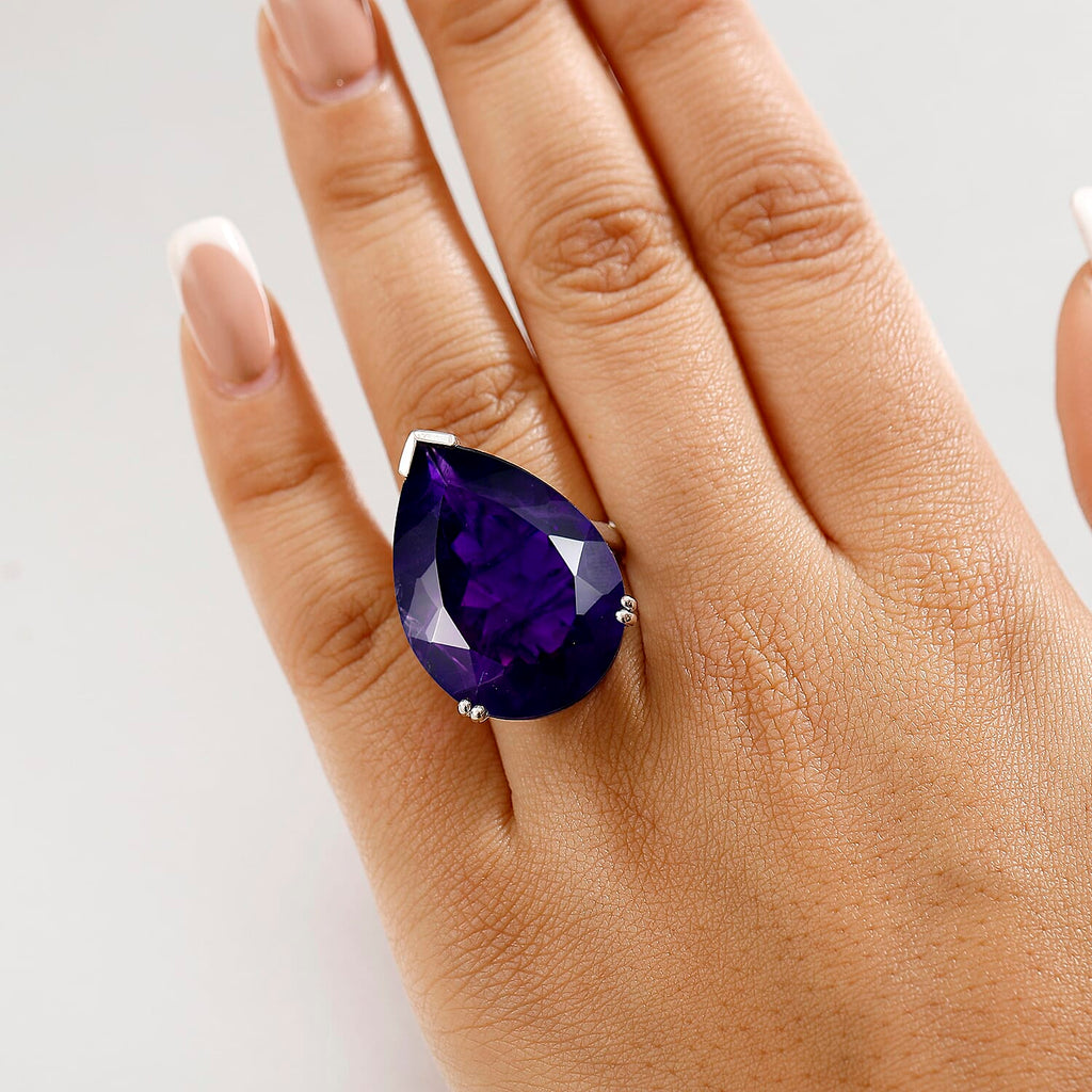 AAA African Amethyst Solitaire Pear Cut Ring in Rhodium Overlay Sterling Silver 35.00 Ct