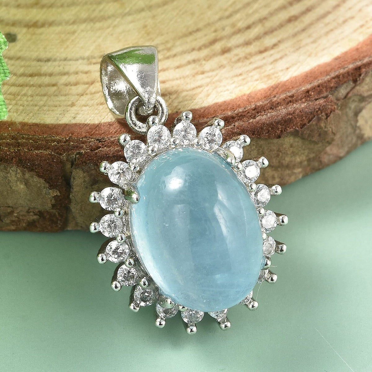 Aquamarine and Simulated Diamond Halo Pendant in Silver Tone 3882624 1