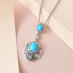 Arizona Sleeping Beauty Turquoise and Natural Zircon Pendant with Chain (Size - 20) in Platinum Overlay Sterling Silver 1.080 Ct