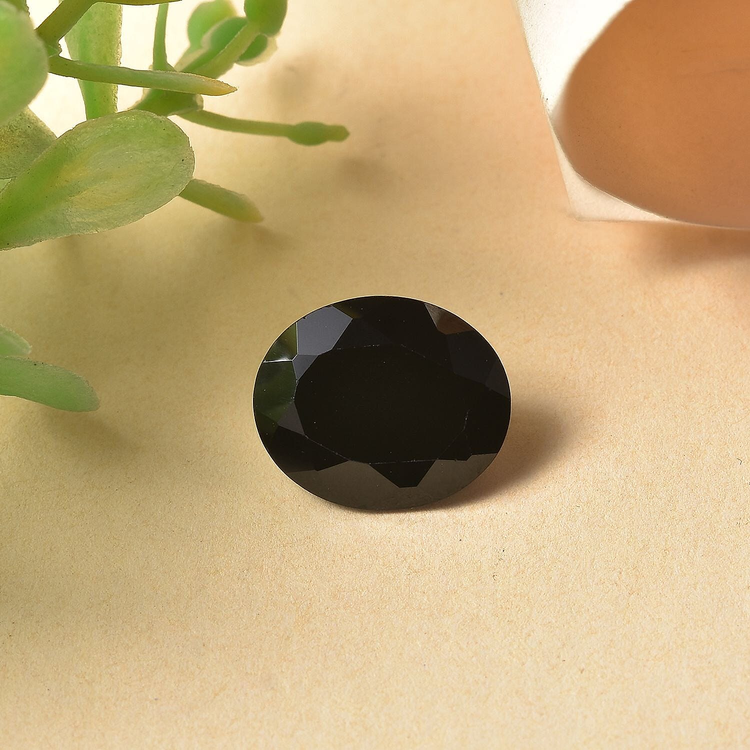 A Black Spinel Loose Gemstone in Oval Shape (12x10mm) 5.09 ct. 8025677 1