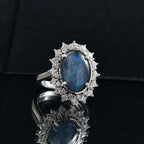 AAA Rare Size Boulder Opal (14X10 mm) and Moissanite Ring in Rhodium OverlaySterling Silver. Total Wt 4.50 Cts