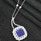 Certified and Appraised RHAPSODY 950 Platinum AAAA Tanzanite, White Diamond VS Pendant 43.35 Ct.
