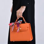 Elegant Crossbody Bag with Scarf & Adjustable Strap - Orange