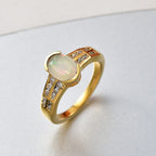 D'Joy Faceted Ethiopian Opal & White Zircon Oval Cut Halo Ring in Yellow Gold Plated Sterling Silver 1.12 Ct.