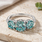 EVENT EXCLUSIVE - Paraiba Colour Moissanite Trilogy Ring in Rhodium Overlay Sterling Silver 4.00 Ct