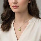 D'Joy Peridot Pear Cut Solitaire Pendant in Rhodium Overlay Sterling Silver 1.80 Ct.