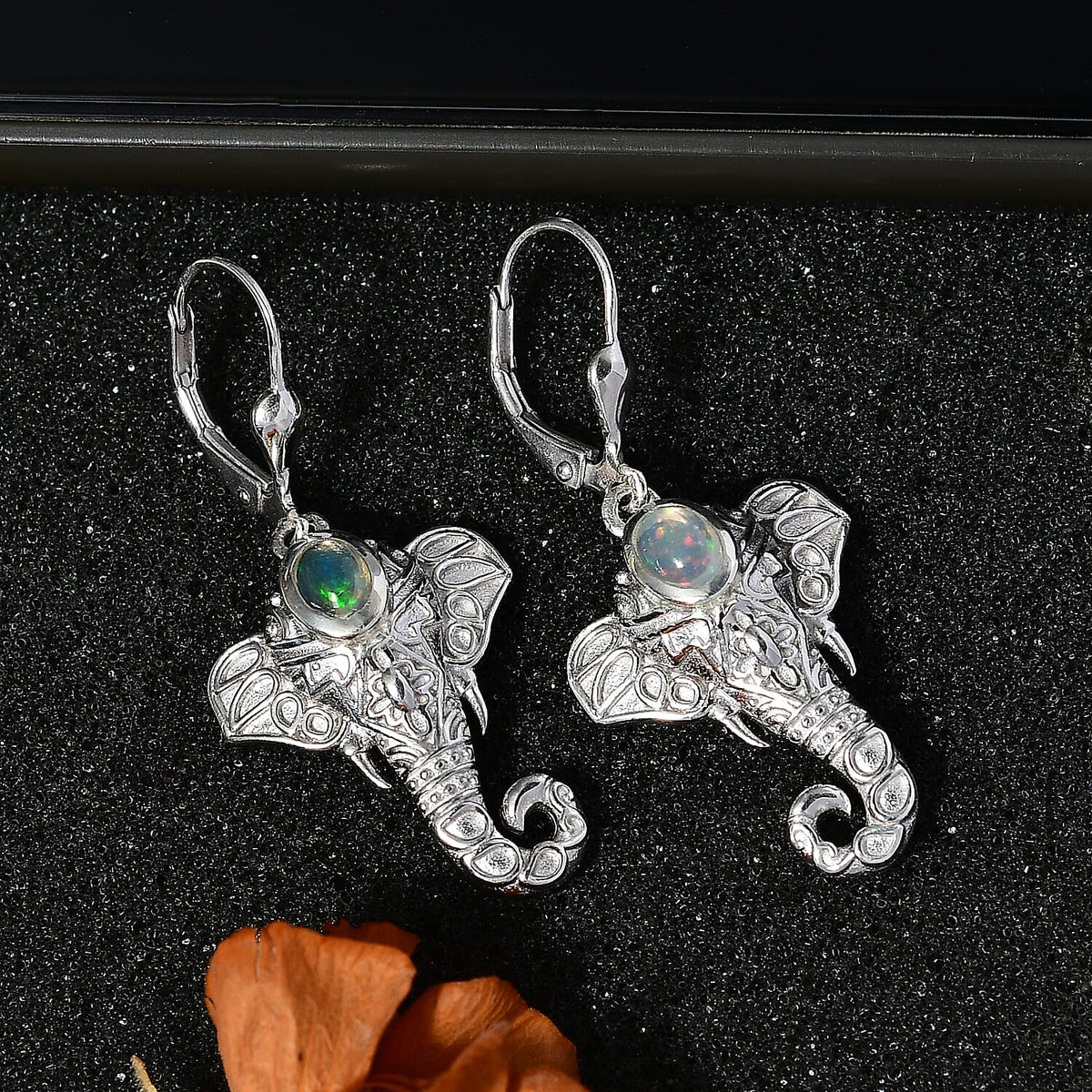 Ethiopian Opal  Fancy Earring in rhodium Sterling Silver 0.70 ct,  Silver Wt. 6 Gms  0.610  Ct. 7847250 2
