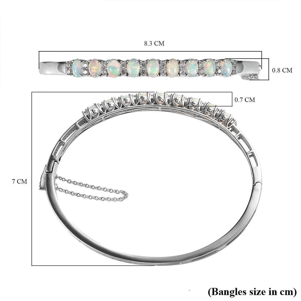 Ethiopian Welo Opal and Natural Zircon Bangle (Size 7.5) in Platinum Overlay Sterling Silver 3.58 Ct, Silver Wt. 15.55 Gms.