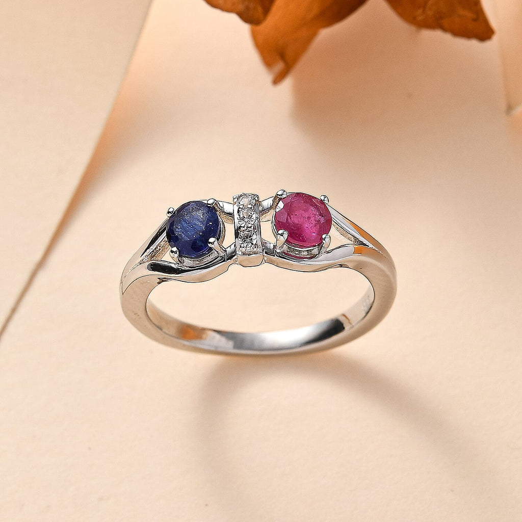 Fissure Filled Blue Sapphire ,  White Zircon  Solitaire Ring in Platinum Overlay Sterling Silver 0.90 ct  0.904  Ct.
