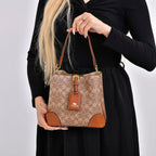 Guanchi Crossbody Bag with Exterior Zipped Pocket & Handle Drop - Brown