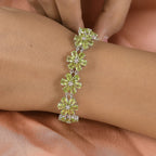 Hebei Peridot Bracelet (Size - 7.5) with GB Lock Box in Platinum Overlay Sterling Silver 31.36 Ct, Silver Wt. 16.73 Gms.