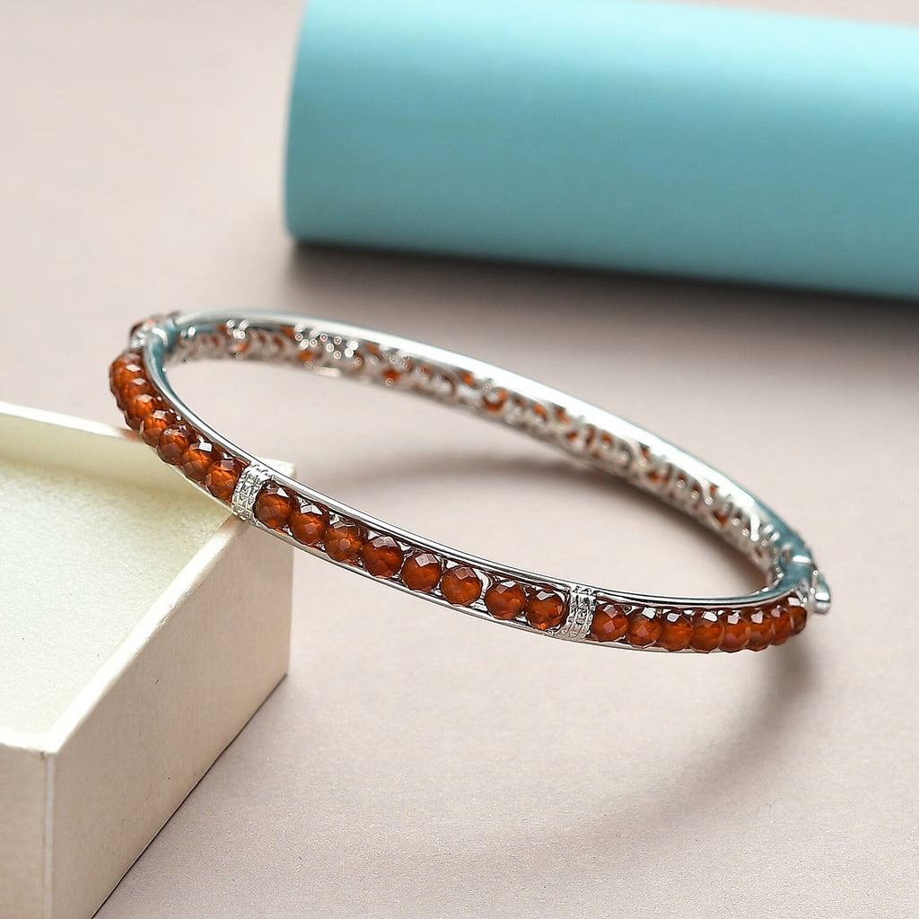 Hessonite Garnet Bangle (Size 7.5) in Platinum Overlay in Silver Tone 16.13 Ct.