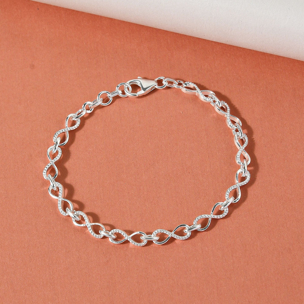 Designer Inspired - Platinum Overlay Sterling Silver Infinity Knot Bracelet (Size - 7) with Lobster Clasp, Silver Wt 6.60 Gms.