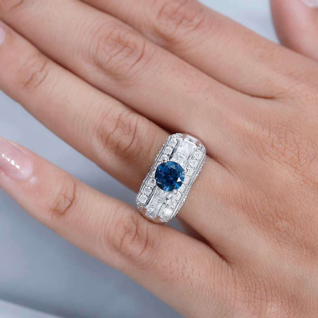 GP Art Deco Collection - London Blue Topaz & Moissanite Ring in Platinum Overlay Sterling Silver 3.52 Ct, Silver Wt 6.95 Gms