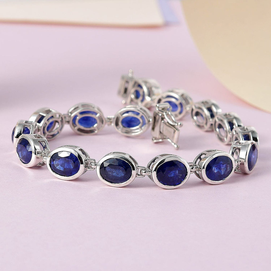 Blue Sapphire Tennis Bracelet (Size - 7.5) with GB Lock Box in Platinum Overlay Sterling Silver 36.11 Ct, Silver Wt. 16.34 Gms.