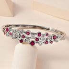 African Ruby & Moissanite Bangle (Size 7.5) in Platinum Overlay Sterling Silver 7.40 Ct, Silver Wt. 21.45 Gms.