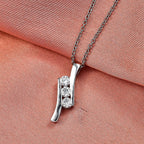 Moissanite S-Curve Pendant in Platinum Overlay Sterling Silver with Chain (Size 20)