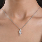 Moissanite S-Curve Pendant in Platinum Overlay Sterling Silver with Chain (Size 20)