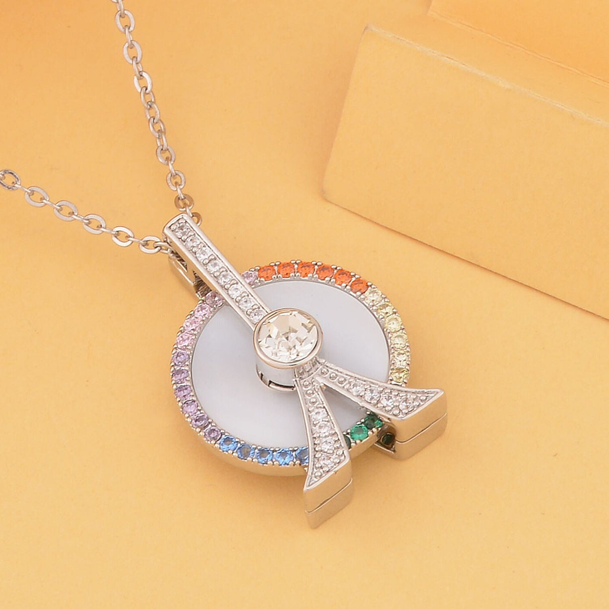 Mother Of Pearl and Simulated Rainbow Sapphire Ferris Wheel Pendant with Chain (Size - 20-2 Inch) in Silver Tone 4127495 1