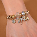 Multi Colour Ceramic Beads Enamelled Charms Dragonfly Adjustable Bracelet in Gold Tone