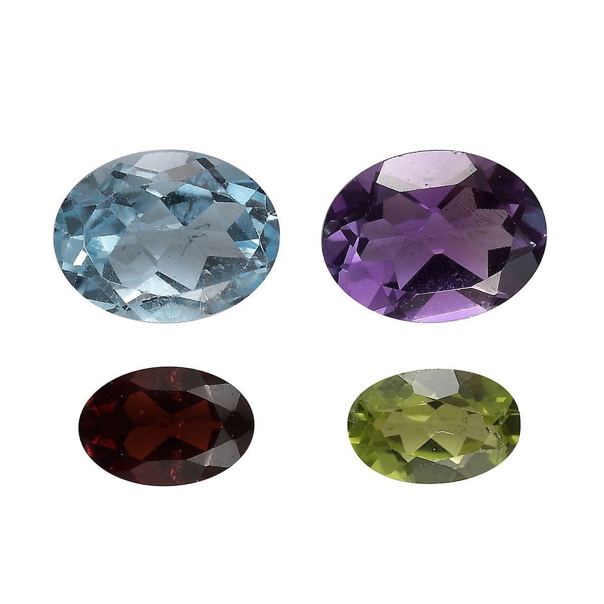 Set of Red Garnet (6X4mm), Peridot (6X4mm), Skyblue Topaz (8x6mm), and African Amethyst (8x6mm) Loos V32607936 0