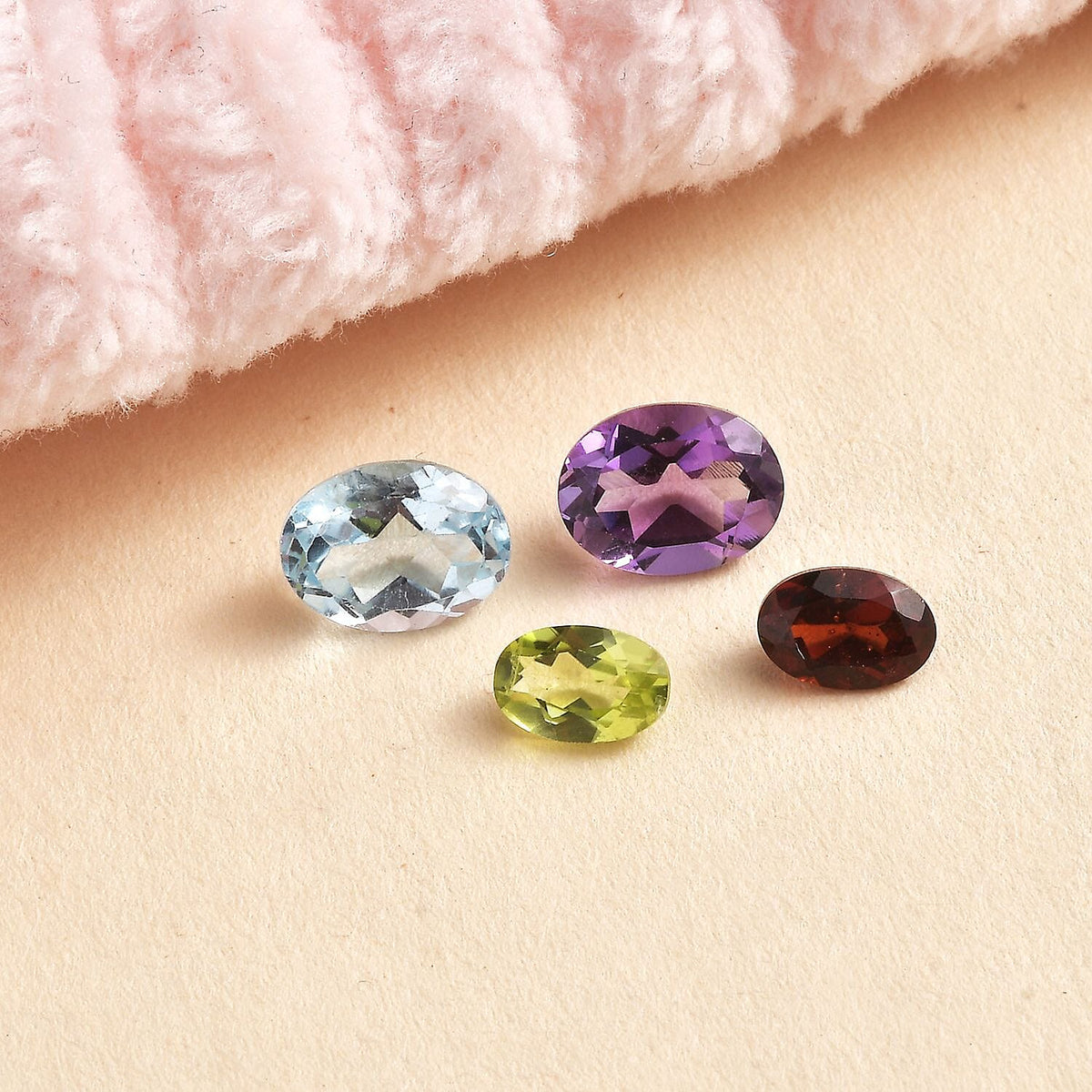 Set of Red Garnet (6X4mm), Peridot (6X4mm), Skyblue Topaz (8x6mm), and African Amethyst (8x6mm) Loos V32607936 2
