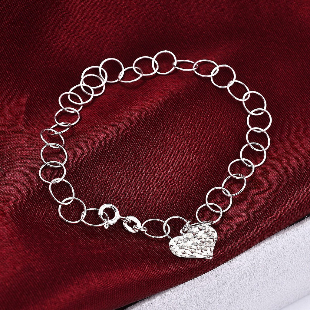 New York Close Out Sterling Silver Round Link Heart Charms Bracelet (Size 7.5) with Spring Ring Clasp.