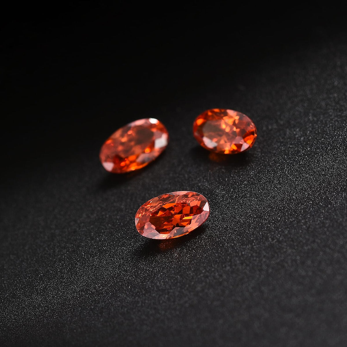 Set of 3 Orange Cubic Zirconia Loose Gemstones in Oval Shape  1.01 Ct. (5x3mm) 8068387 1