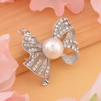Simulated Pearl and White Austrian Crystal Brooch in Silver Tone