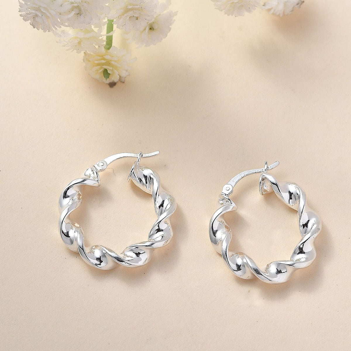 Platinum Overlay Sterling Silver Twisted Hoop Earrings 7737473 1